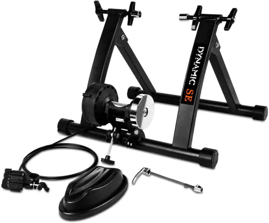 Photo of a black Dynamic SE Indoor Bike Trainer with its accessories.