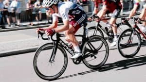 Why Do Road Bikes Have Narrow Tires - Cyclist racing his road bike
