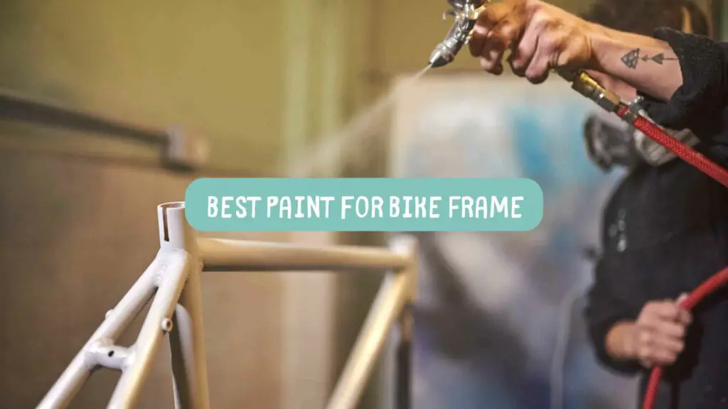 Photo of a person painting a bike frame. Best Paint for Bike Frame.