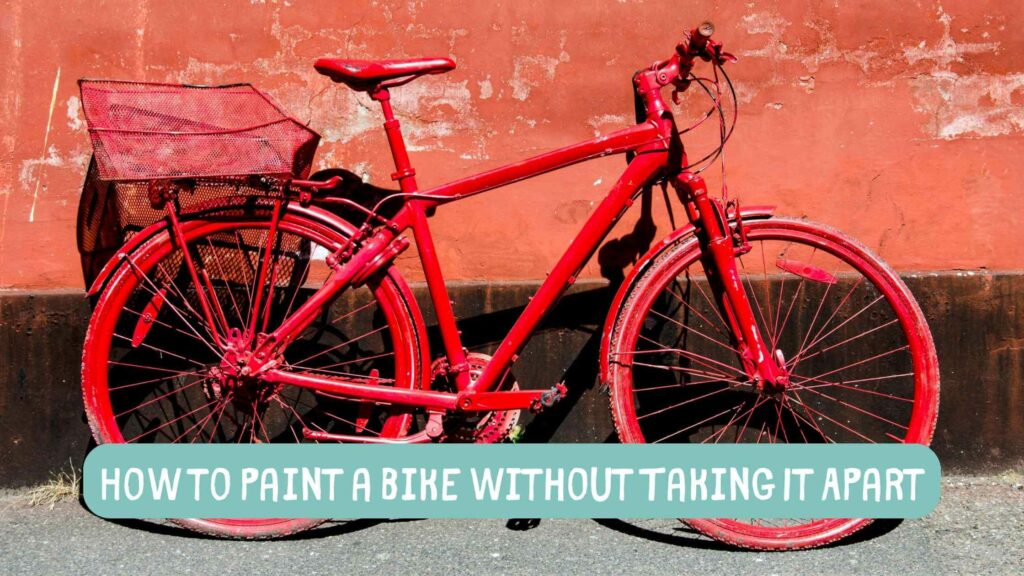 Photo of a bike that was not taken apart before painting so everything is painted red including the tires. How to Paint a Bike Without Taking It Apart.