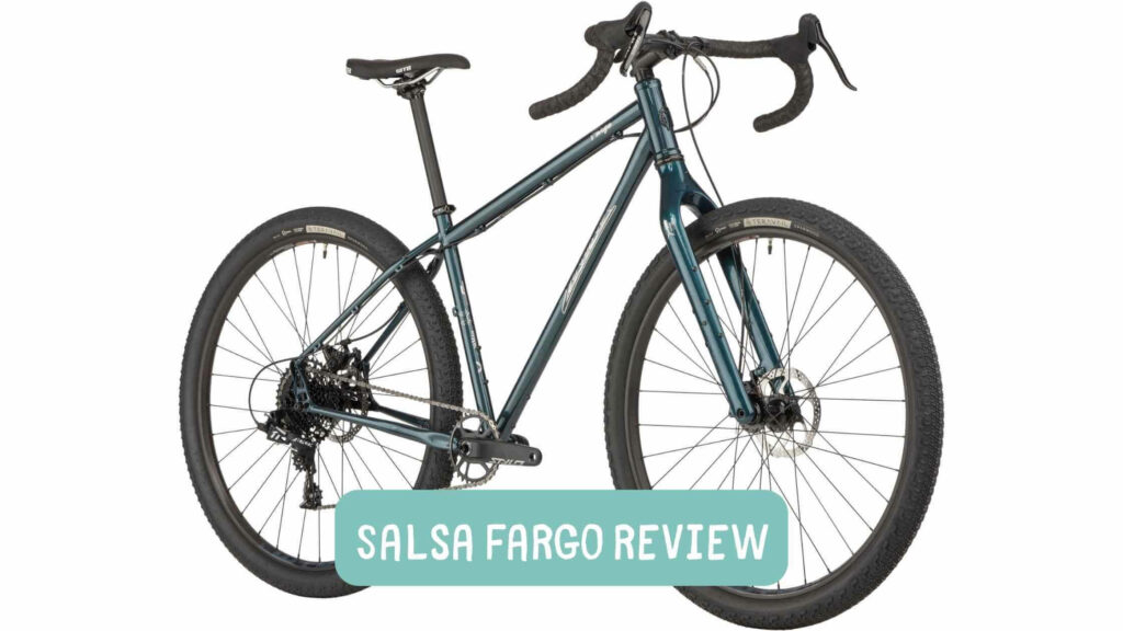 Photo of a Salsa Fargo bicycle in dark green color on a white background. Salsa Fargo Review.