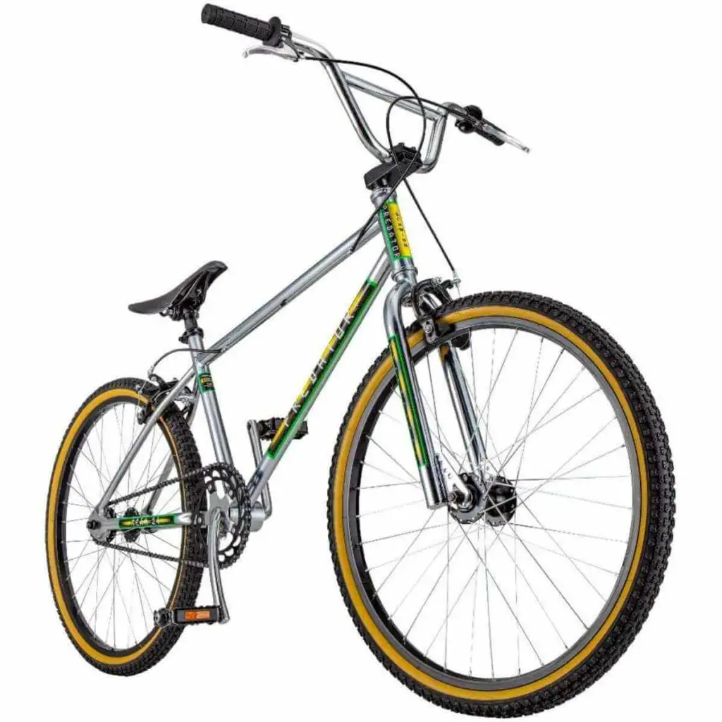 Photo of a Schwinn Predator Team BMX Wheelies Bike in silver with green and yellow stickers and on a white background.