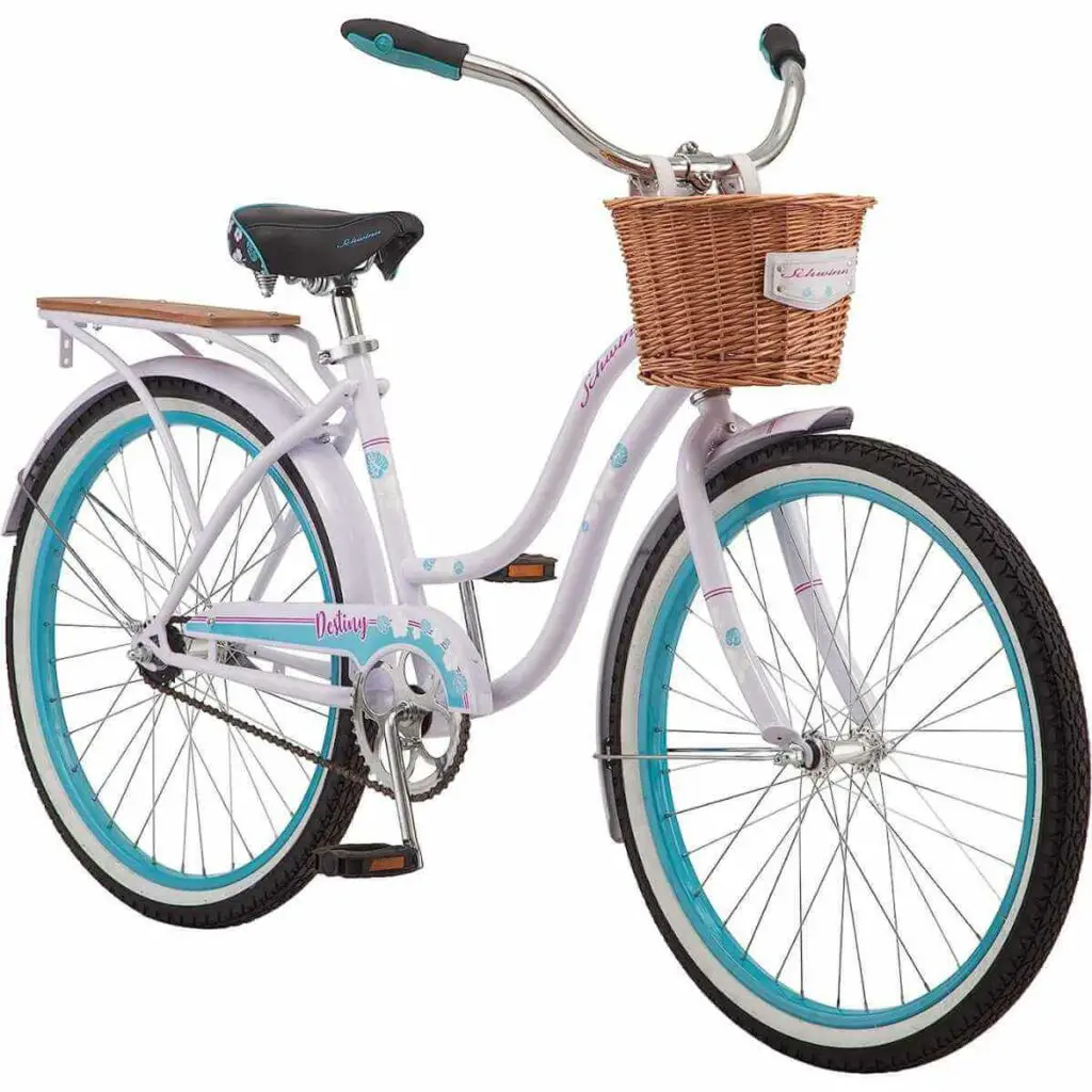 Photo of a white with pink accents Schwinn Women's Baywood Cruiser Bike on a white background.