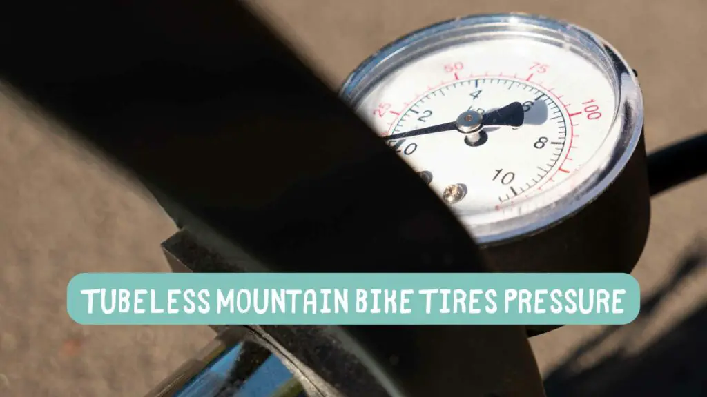 Photo of a pump gauge showing tubeless tire pressure. Tubeless Mountain Bike Tires Pressure.